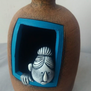Hidden Face Clay Vase